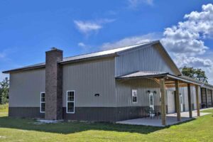 homeguide metal building home with post frame construction and brick chimney